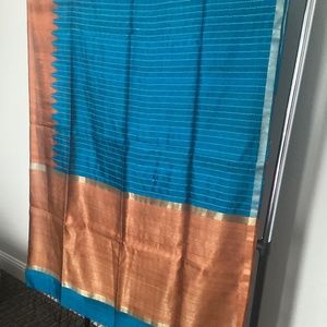 Blue raw silk sari, 6 yards with blouse material attached